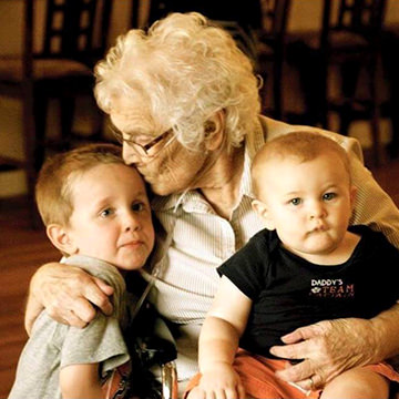 Grandmother with Two Toddlers